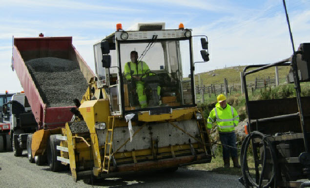 Roadwork squad laying chips on road 